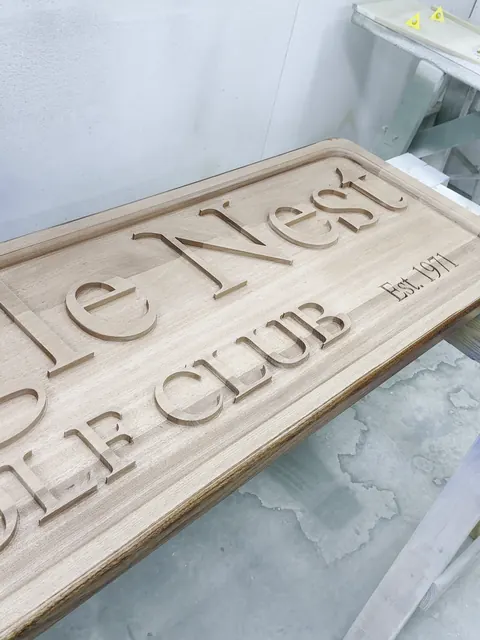 Carved clubhouse sign, carved sign off the CNC, ready for finish (Commercial)