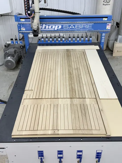 Oak slat wall & floating vanity, slat panels cut on the CNC (Jimmy)