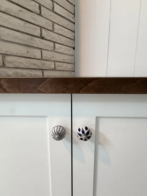 Corner cabinet & walnut floating shelves, finished (Kip Connelly)