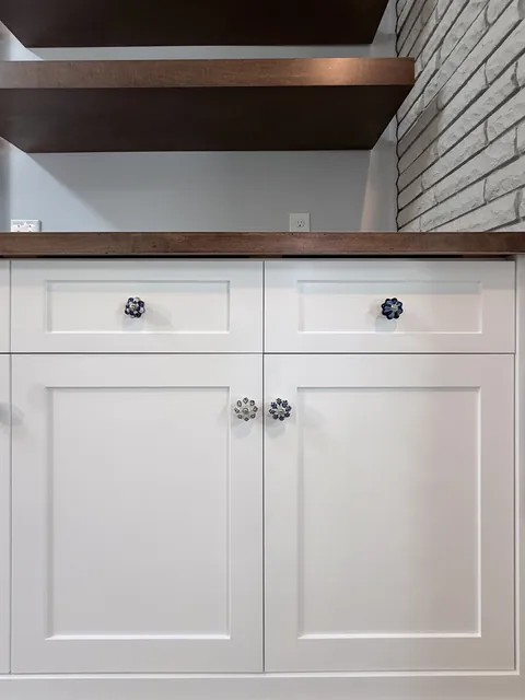 Corner cabinet & walnut floating shelves, finished (Kip Connelly)