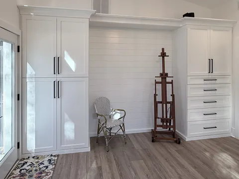 Studio built-ins & navy vanity, Merry project by Ocean Bay Interiors
